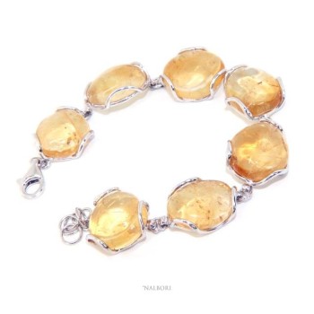 RMB|1000/5000
Woman bracelet in 925 silver and natural yellow citrine stones 30 gr